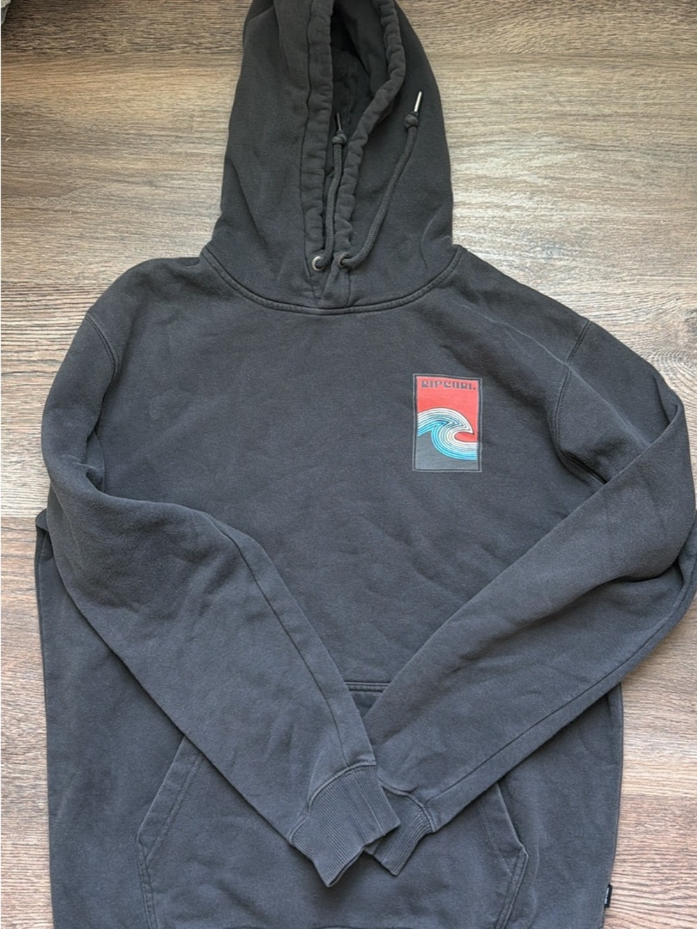 Rip Curl Black Hoodie with Red and Blue Wave Patch